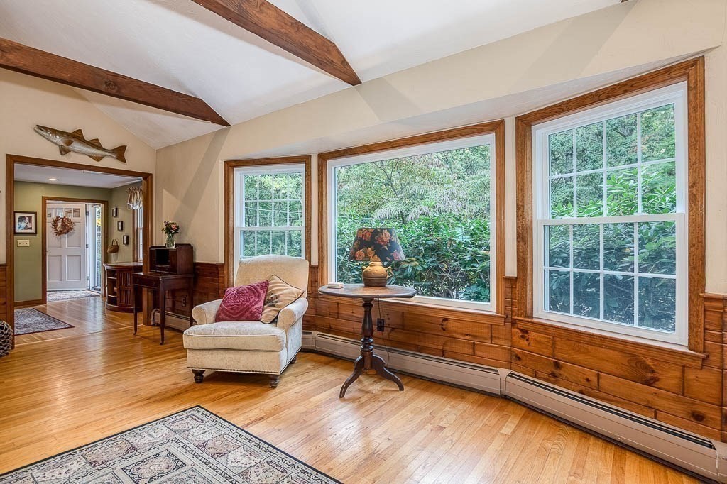 1 Intervale Road Dedham, MA 02026 - Photo 8 of 42 a living room with furniture and a large window