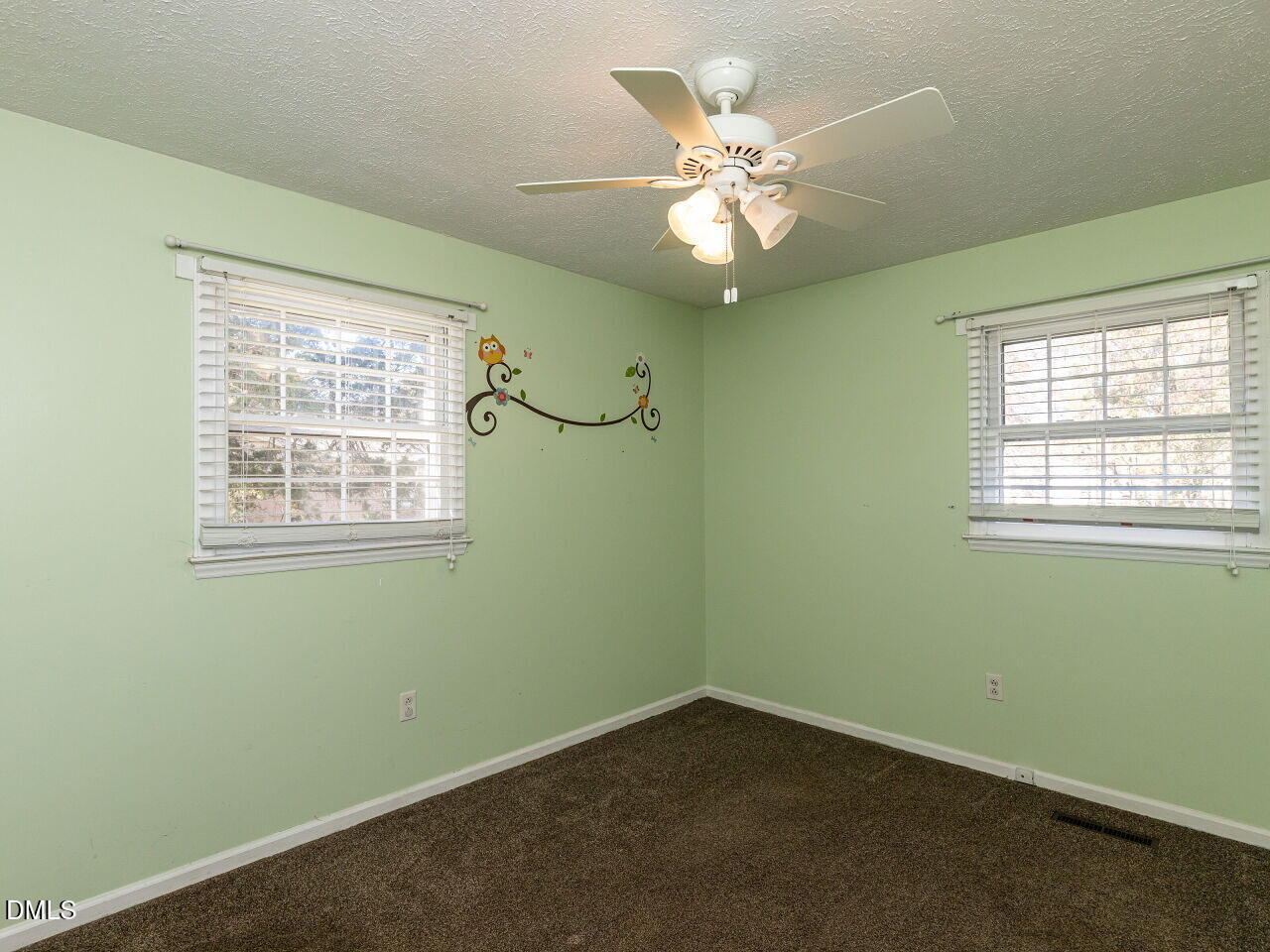 2368 Swift Creek Road Clayton, NC 27520 - Photo 13 of 31 an empty room with windows and fan