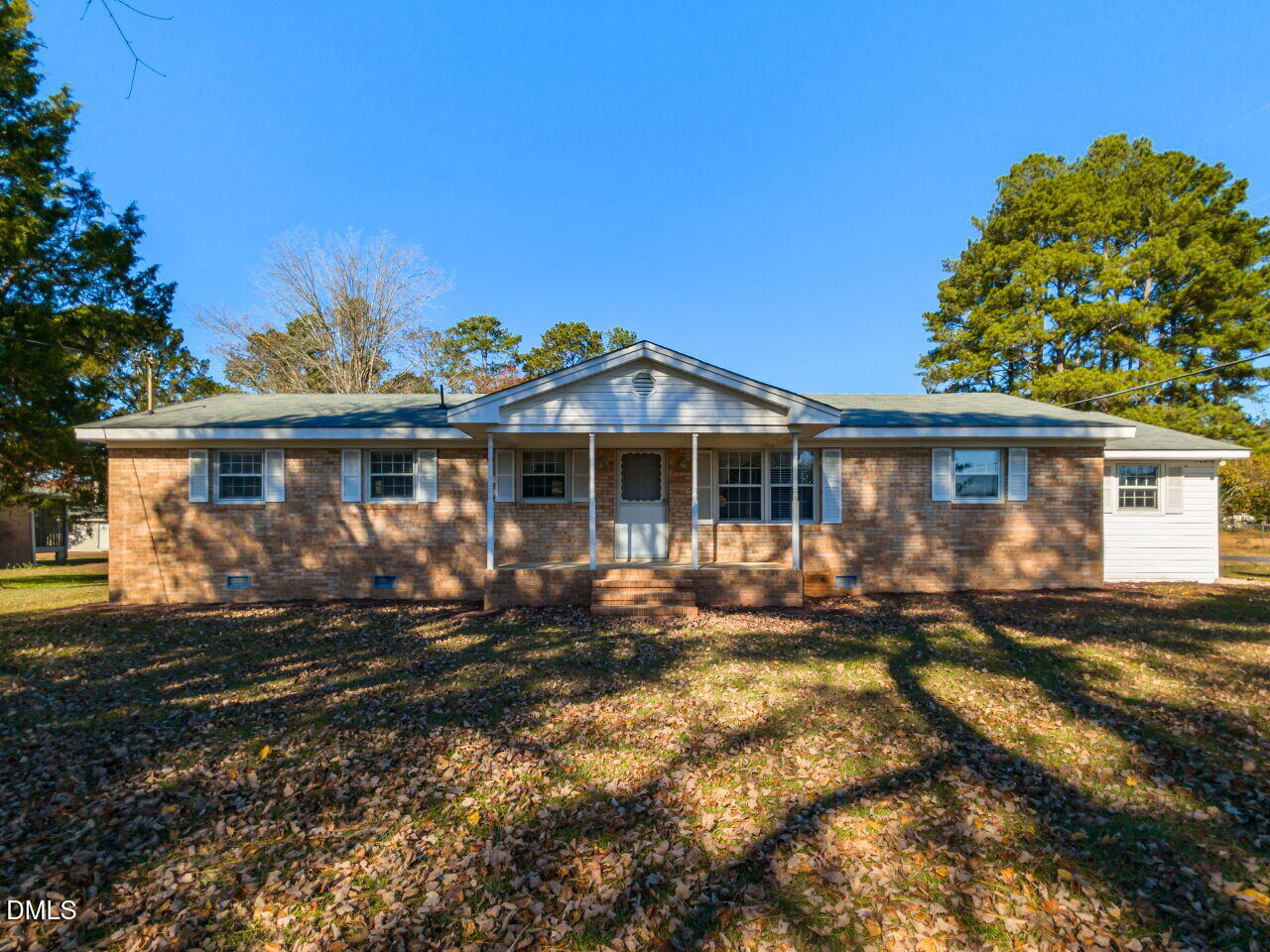 2368 Swift Creek Road Clayton, NC 27520 - Photo 2 of 31 front view of a house with a yard
