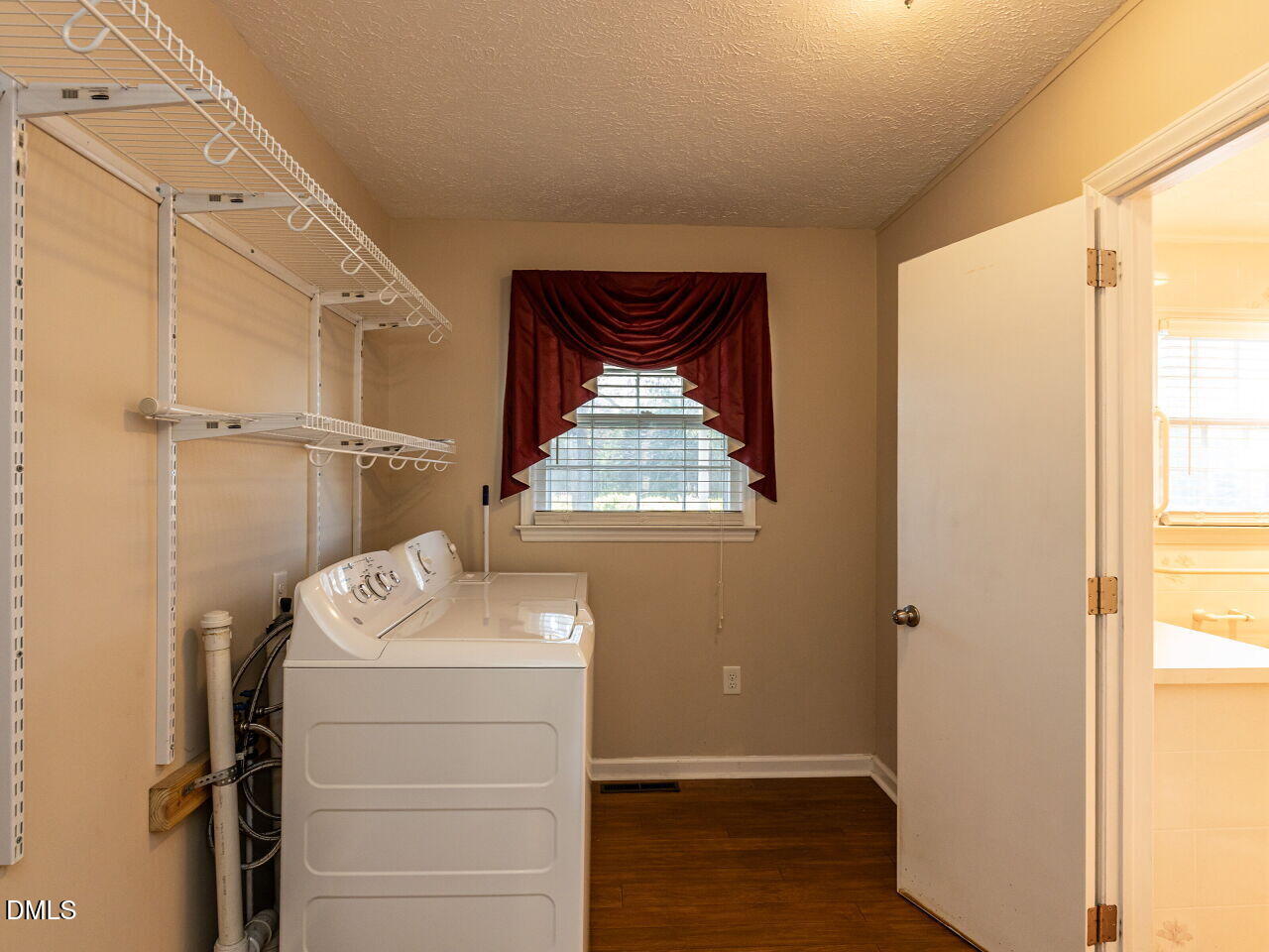 2368 Swift Creek Road Clayton, NC 27520 - Photo 23 of 31 a utility room with dryer and washer