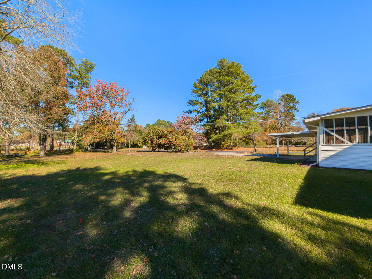 2368 Swift Creek Road Clayton, NC 27520 - Photo 31 of 31 a view of a house with a yard