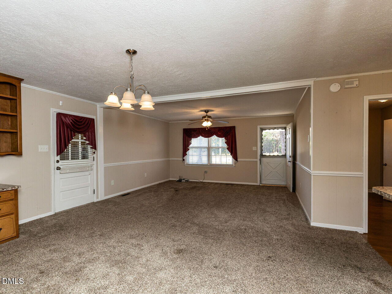 2368 Swift Creek Road Clayton, NC 27520 - Photo 9 of 31 en empty room with windows