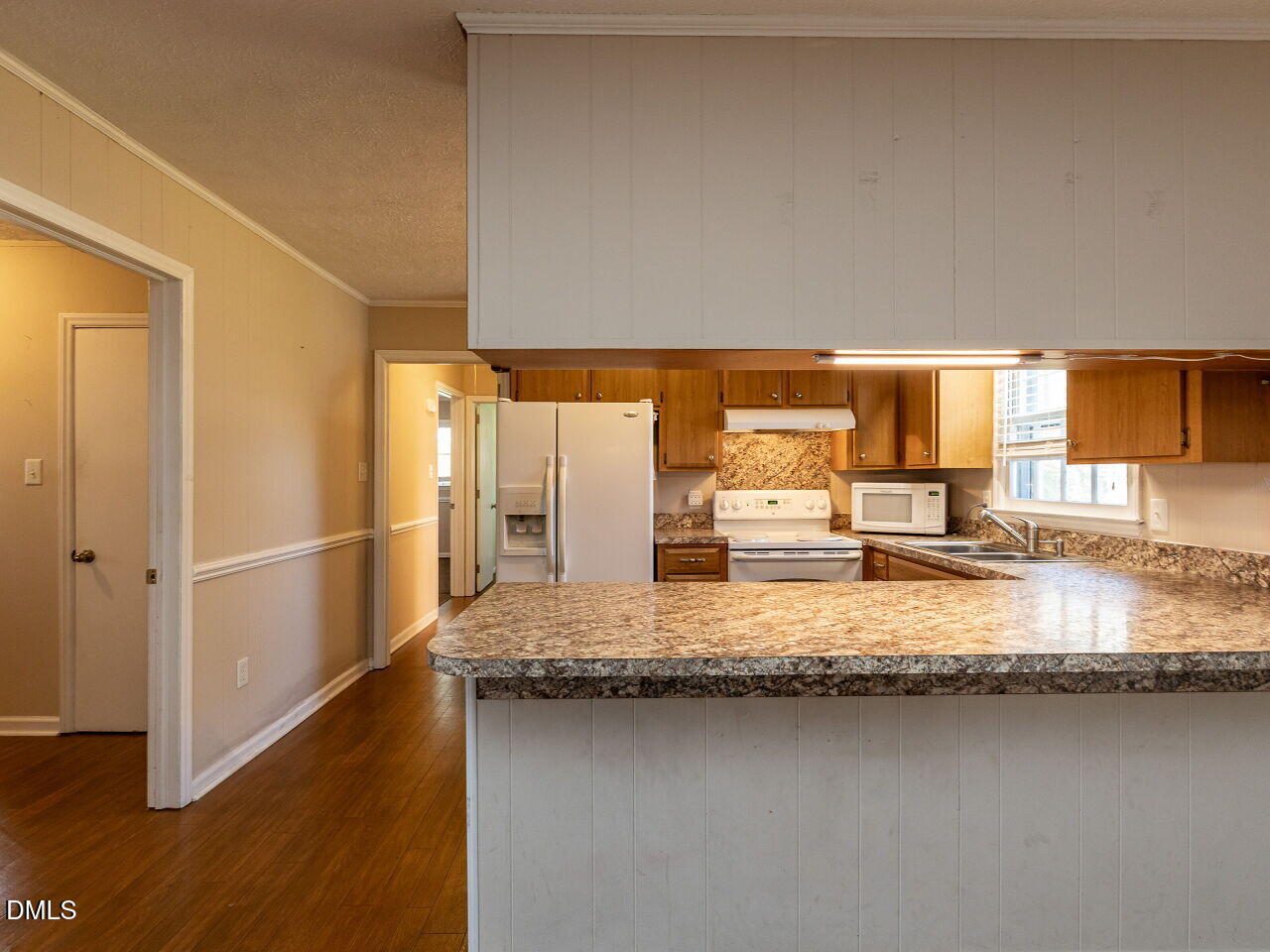 2368 Swift Creek Road Clayton, NC 27520 - Photo 10 of 31 a bathroom with a granite countertop sink and a large mirror