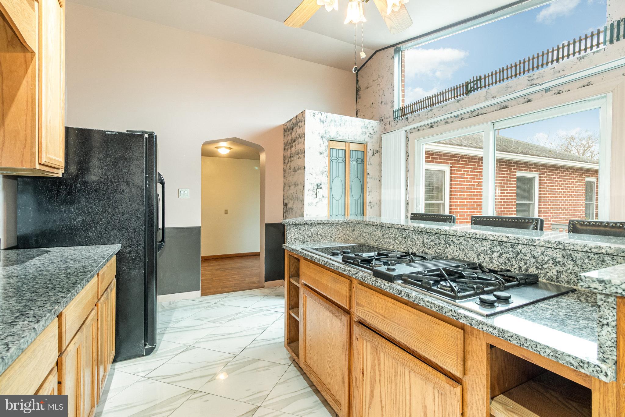 6112 Linglestown Road Harrisburg, PA 17112 - Photo 11 of 45 a kitchen with stainless steel appliances granite countertop a stove and a sink