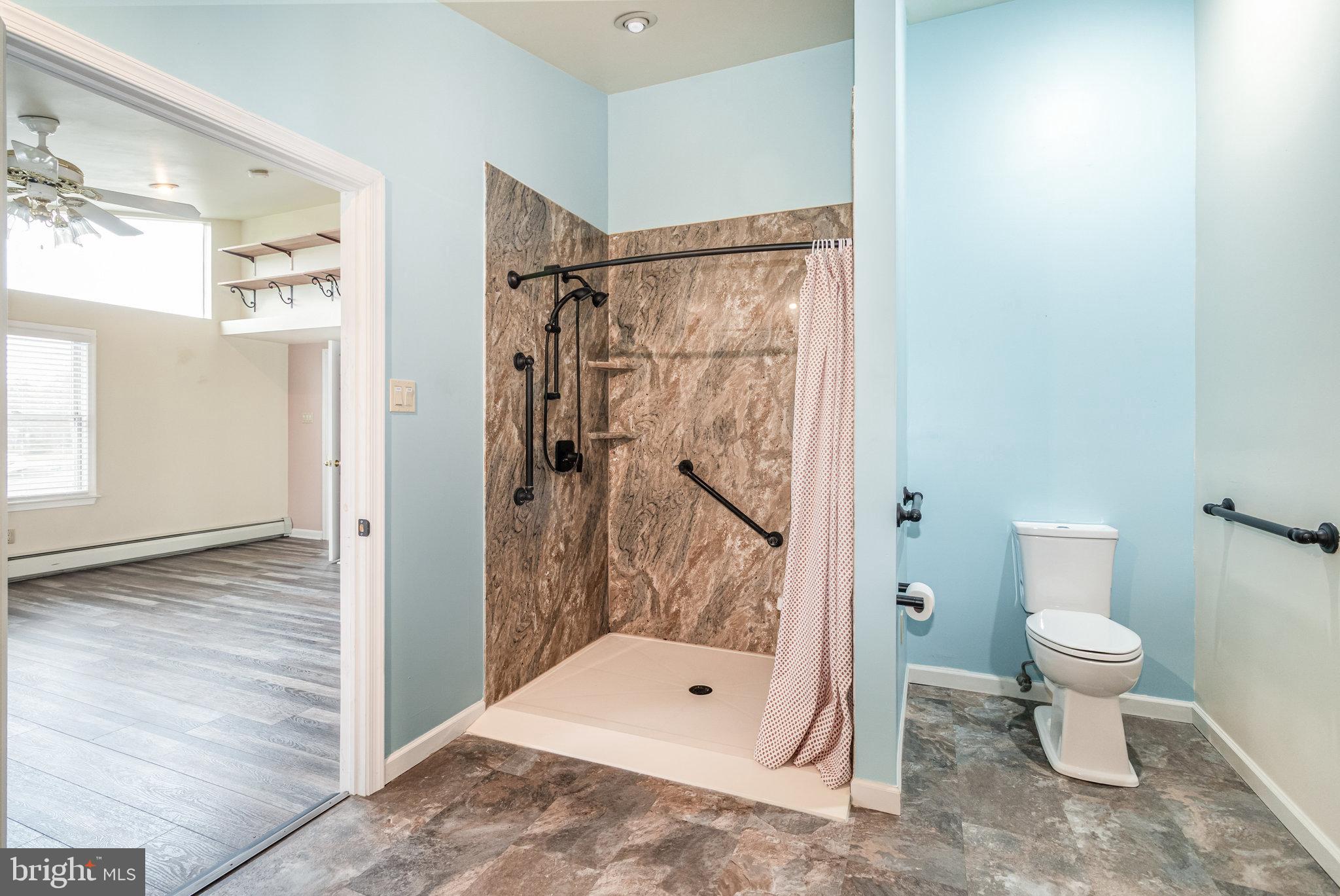 6112 Linglestown Road Harrisburg, PA 17112 - Photo 19 of 45 a bathroom with a toilet sink and shower
