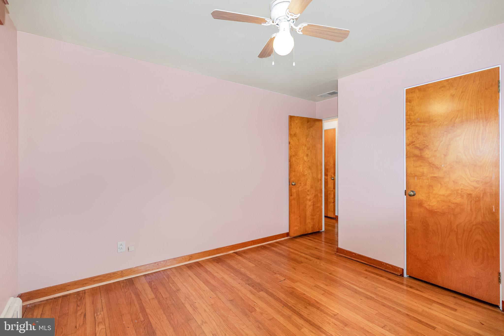 6112 Linglestown Road Harrisburg, PA 17112 - Photo 23 of 45 an empty room with wooden floor and closet
