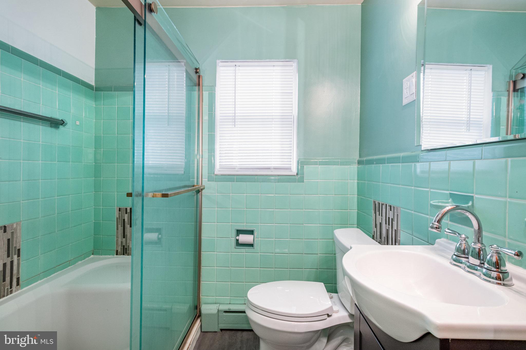 6112 Linglestown Road Harrisburg, PA 17112 - Photo 27 of 45 a bathroom with a sink a toilet and shower