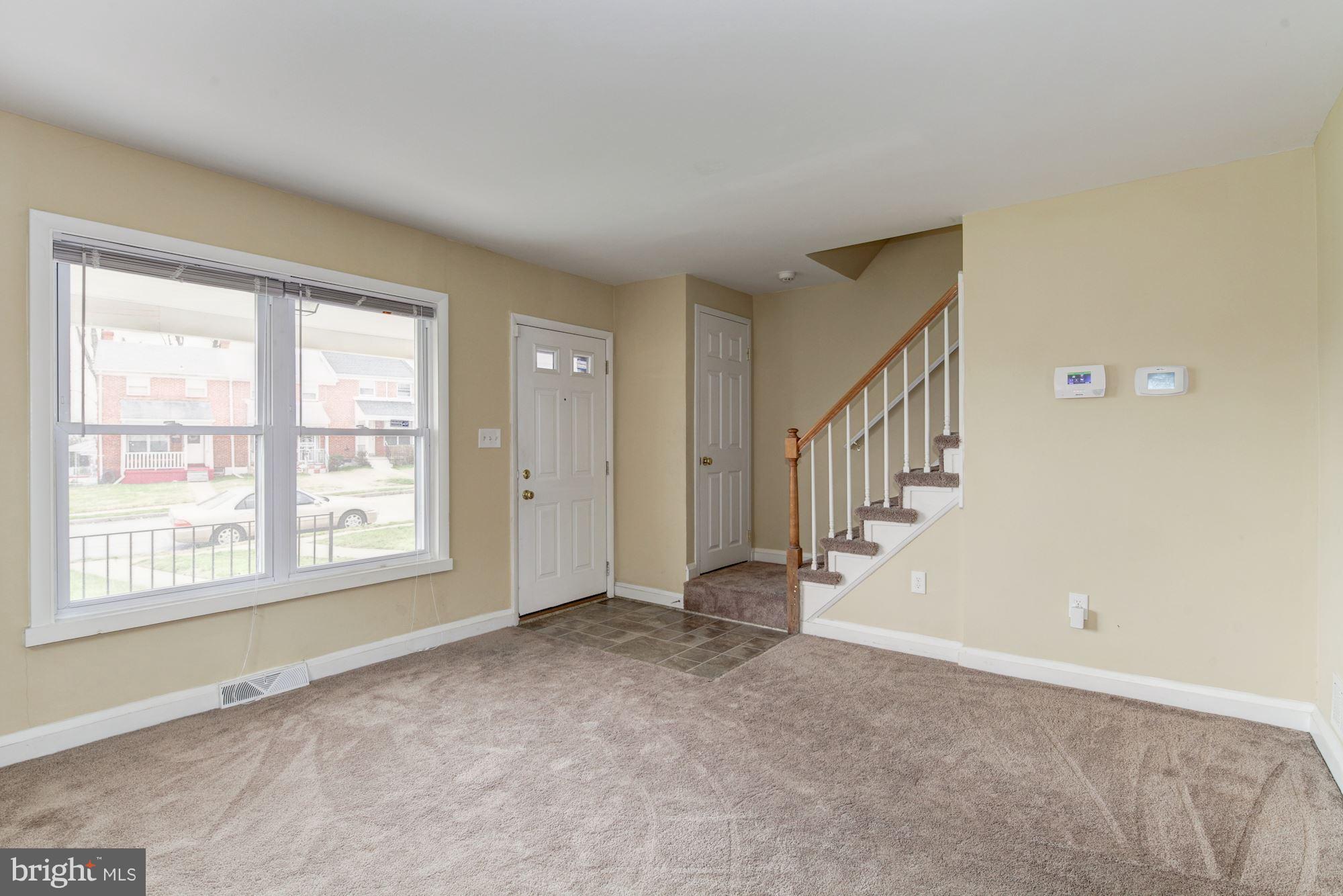 514 Queensgate Road Baltimore, MD 21229 - Photo 4 of 29 Living Room, Staircase to 2nd floor