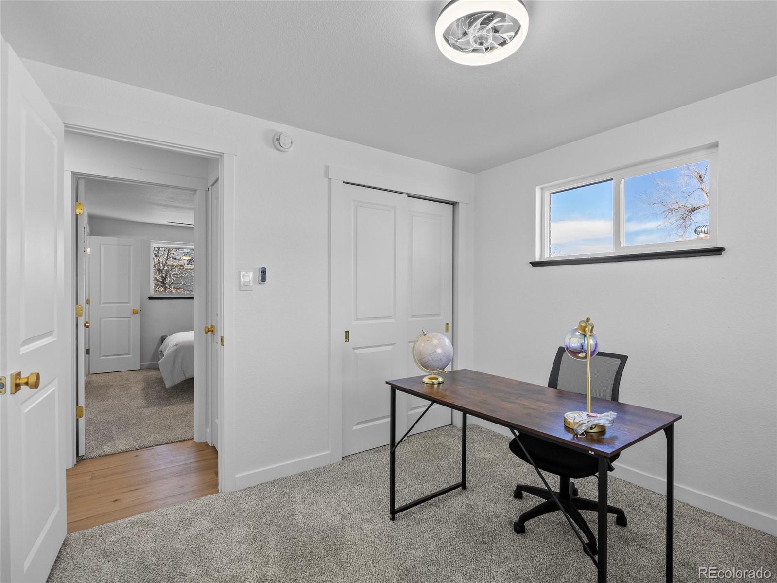 5673 Johnson Street Arvada, CO 80002 - Photo 24 of 40 a view of a room with gym equipment