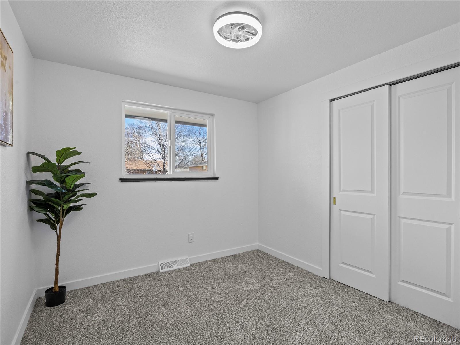 5673 Johnson Street Arvada, CO 80002 - Photo 25 of 40 a view of entryway with window