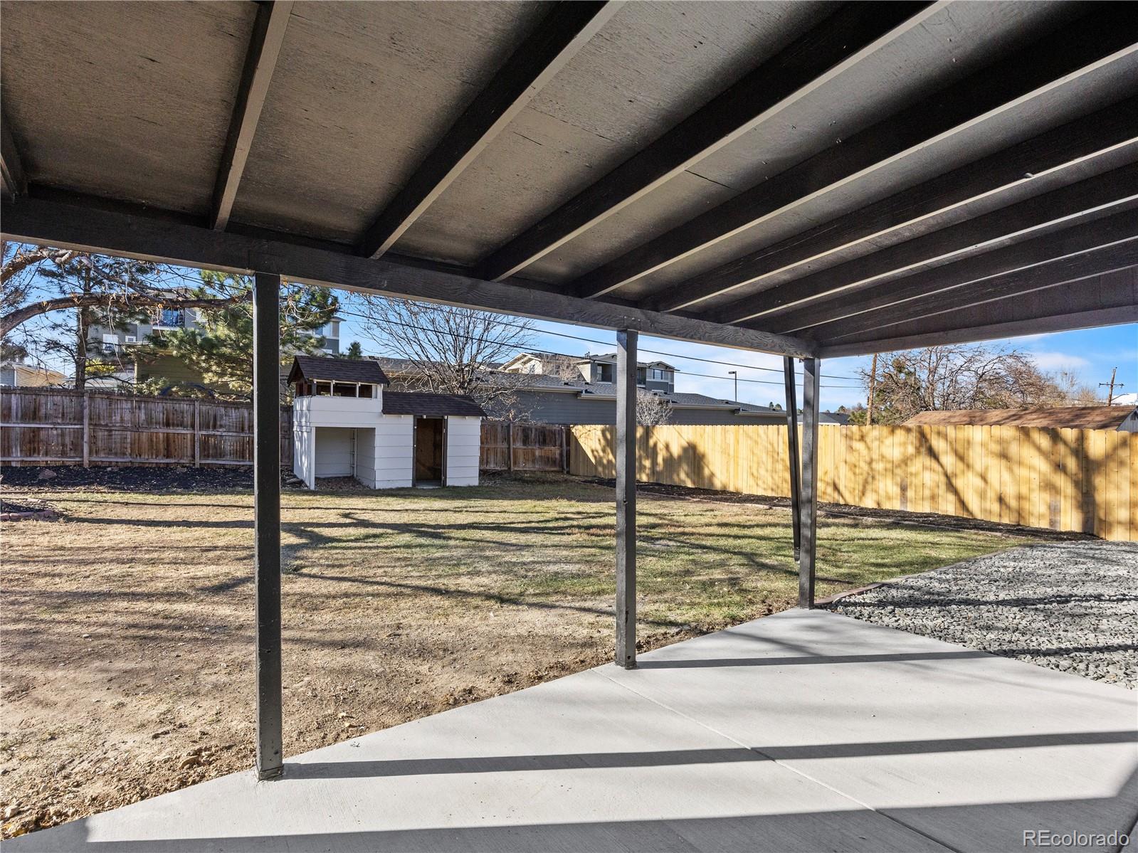 5673 Johnson Street Arvada, CO 80002 - Photo 35 of 40 a view of a porch