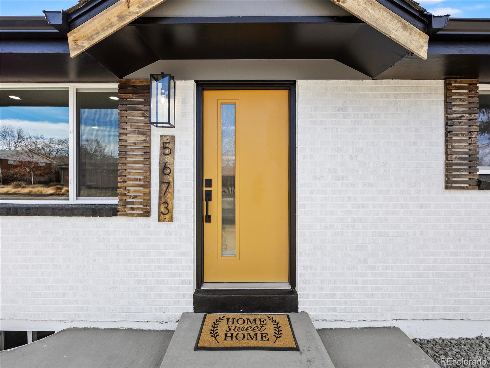 5673 Johnson Street Arvada, CO 80002 - Photo 6 of 40 a view of front door