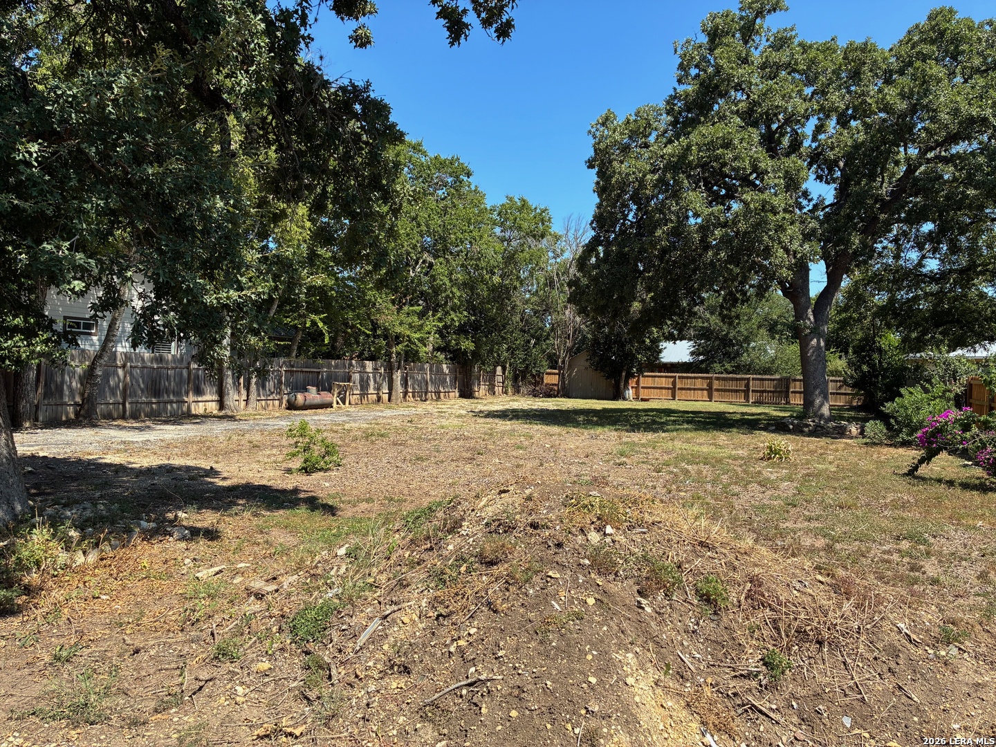 314 East Bandera Road Boerne, TX 78006 - Photo 5 of 8 a view of outdoor space with deck and trees