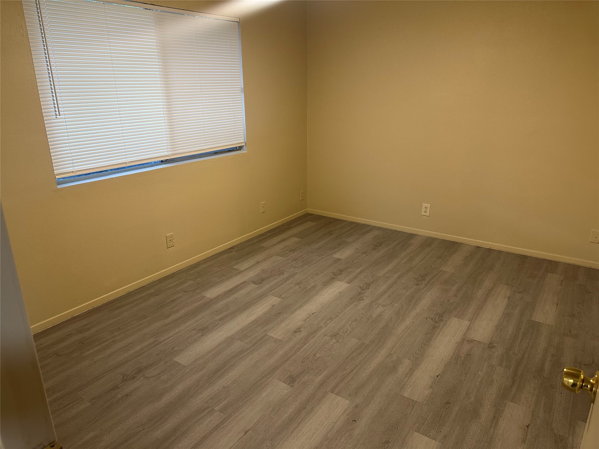 2602 South Bagdad Road, Unit A Leander, TX 78641 - Photo 7 of 26 An airy bedroom with contemporary flooring and natural light.