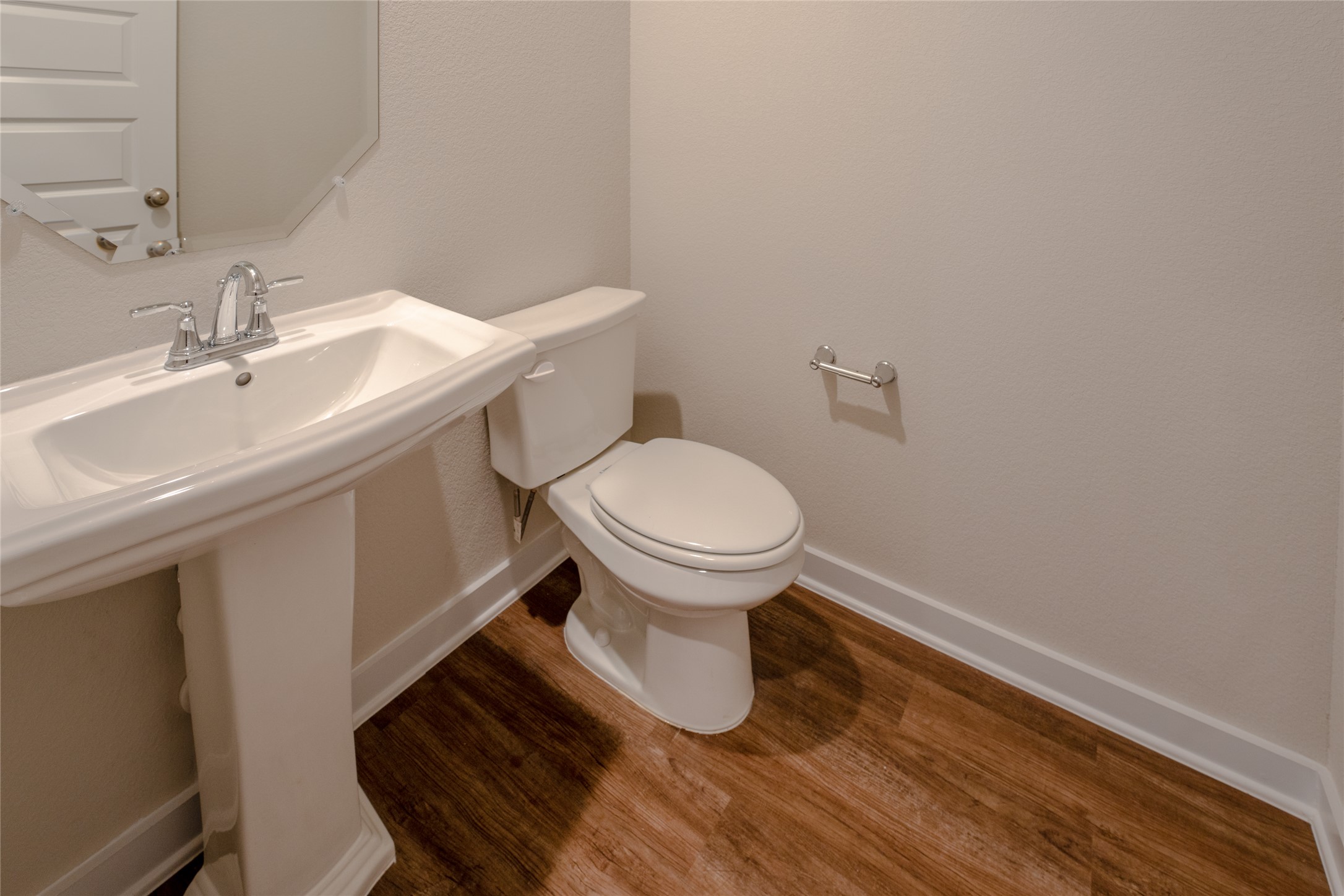 133 High Plains Drive Georgetown, TX 78628 - Photo 23 of 38 a bathroom with a sink toilet and a mirror