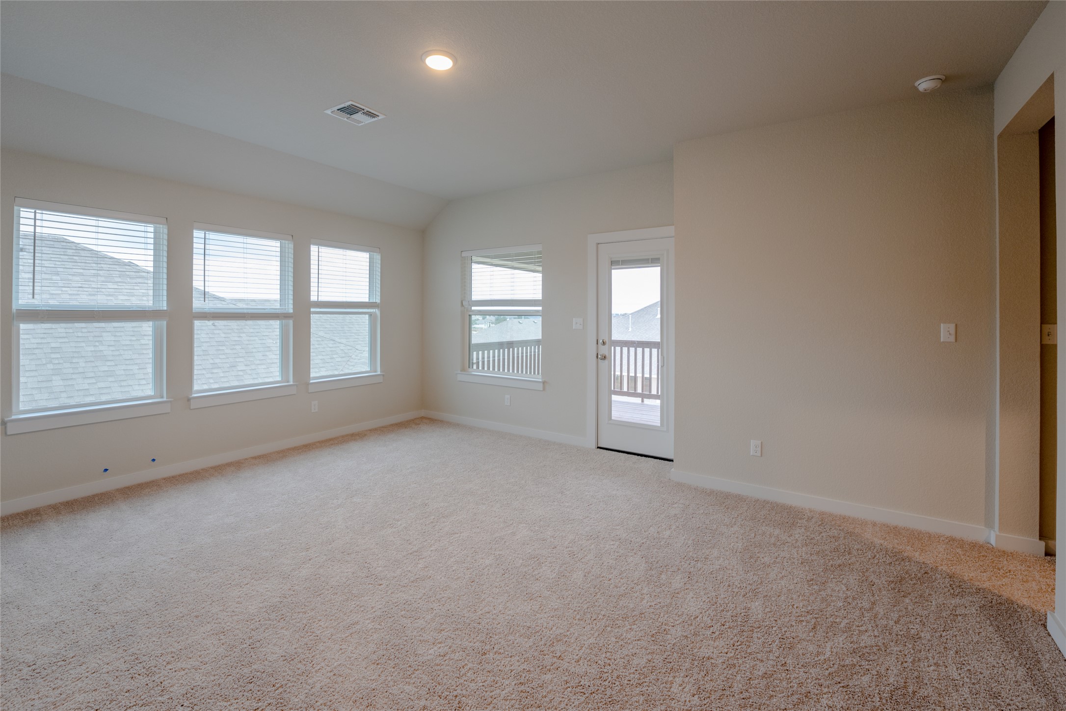 133 High Plains Drive Georgetown, TX 78628 - Photo 24 of 38 an empty room with windows