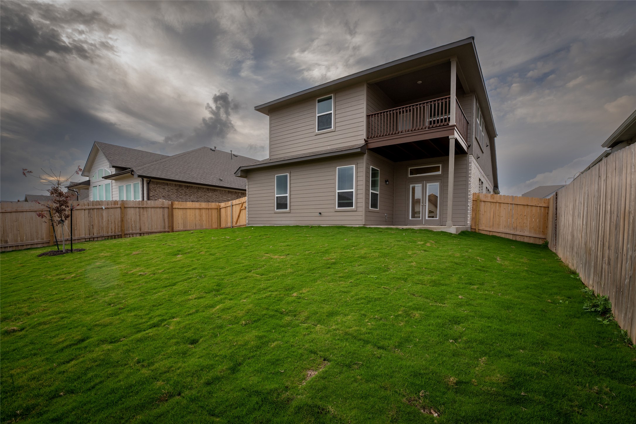 133 High Plains Drive Georgetown, TX 78628 - Photo 36 of 38 a view of a house with a back yard