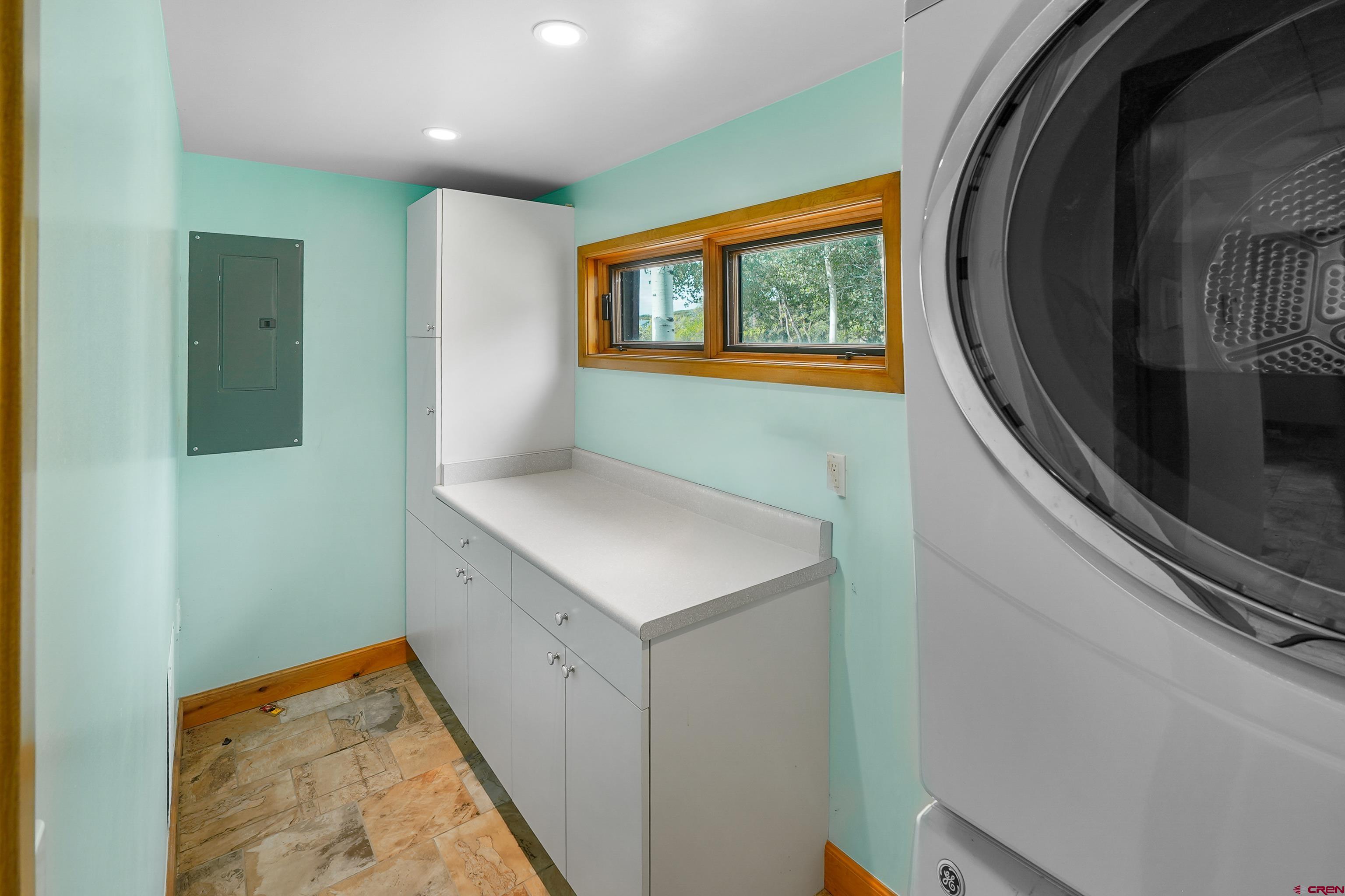 4462 County Road 124 Durango, CO 81301 - Photo 29 of 44 a view of a hallway with washer and dryer