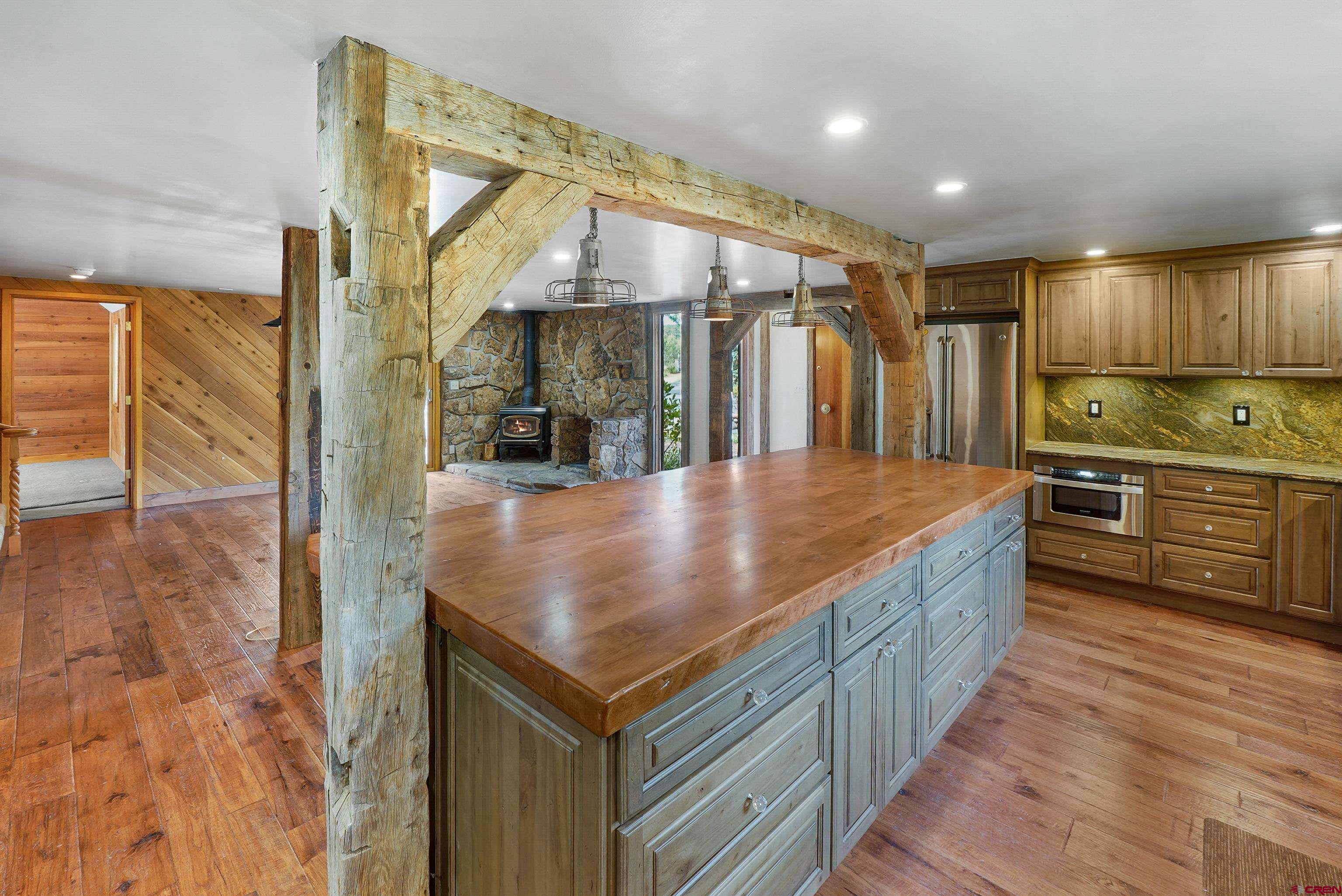 4462 County Road 124 Durango, CO 81301 - Photo 3 of 44 a kitchen with stainless steel appliances granite countertop a sink and cabinets