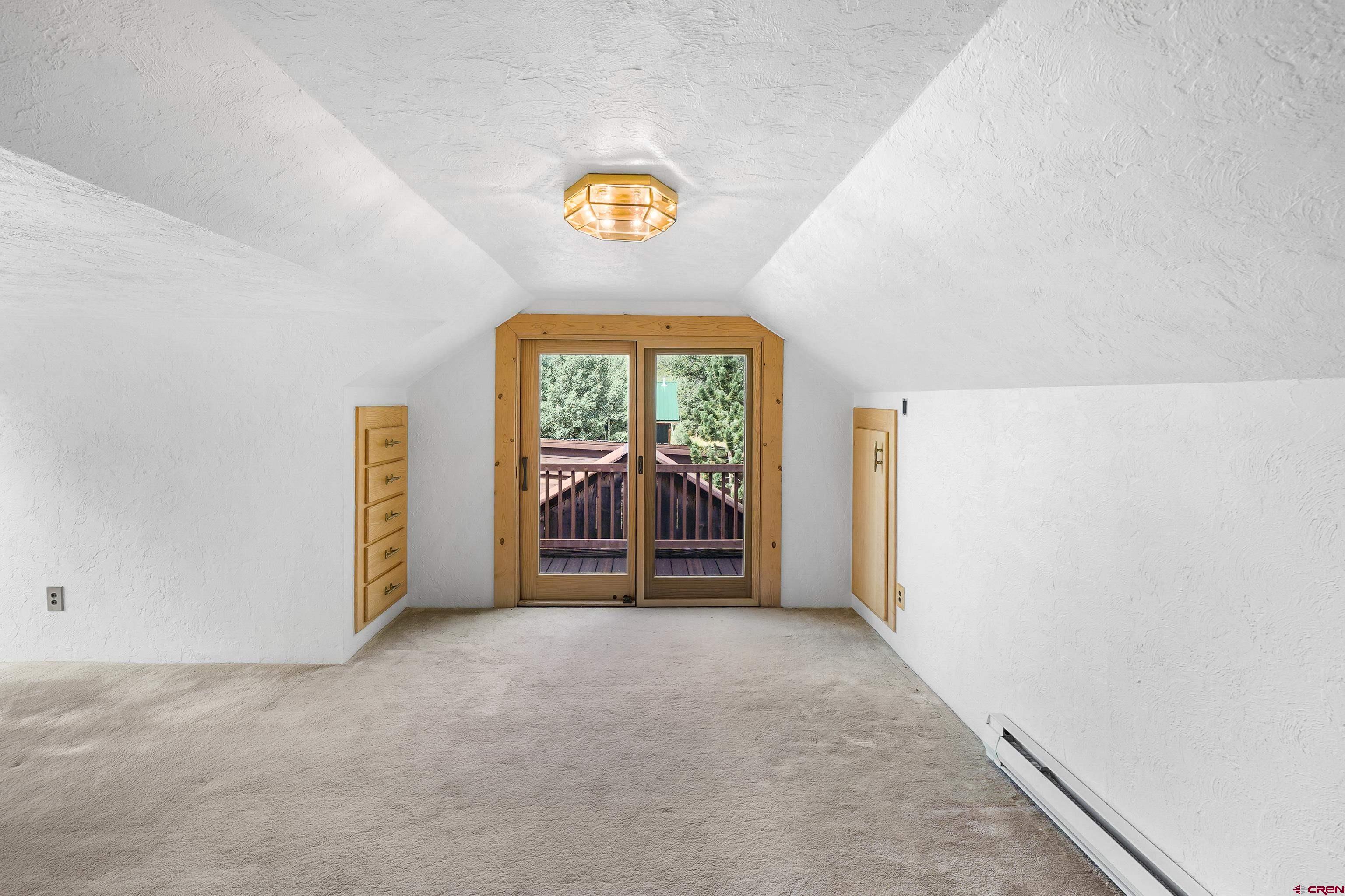 4462 County Road 124 Durango, CO 81301 - Photo 33 of 44 an empty room with windows