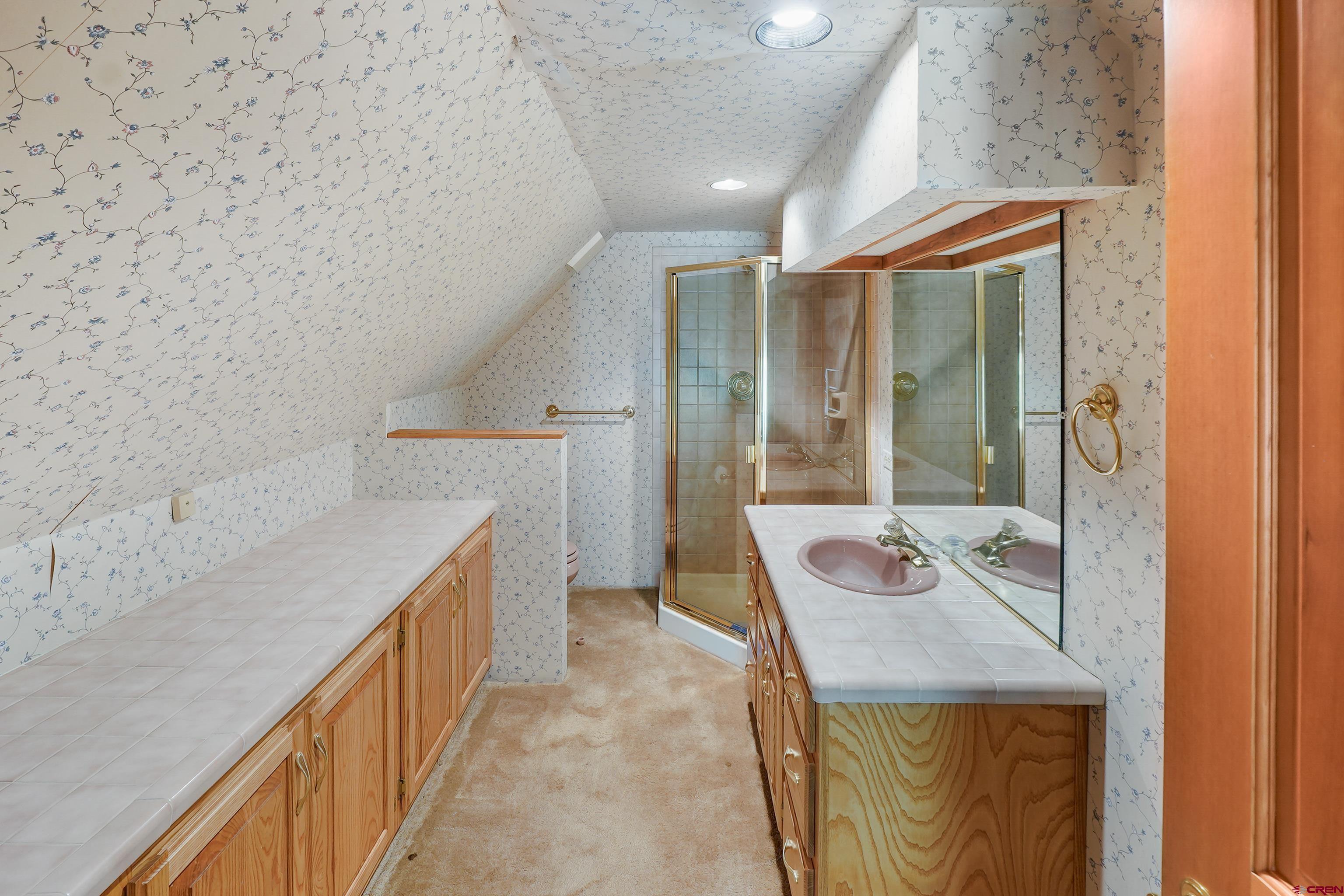 4462 County Road 124 Durango, CO 81301 - Photo 34 of 44 a bathroom with a sink and a mirror