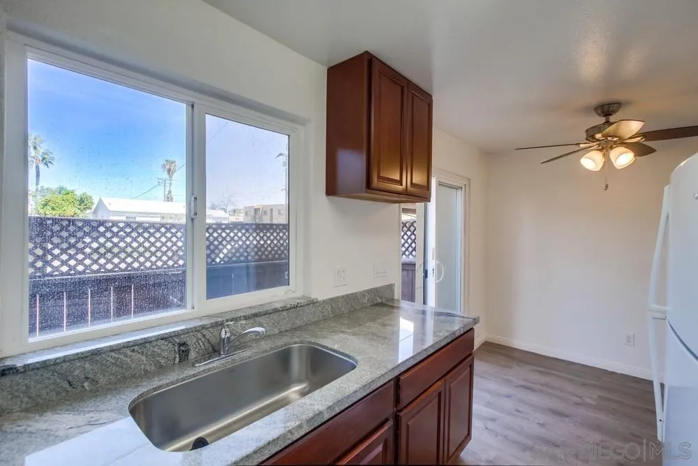300 Filbert Street, Unit 2 El Cajon, CA 92020 - Photo 17 of 35 a kitchen with a sink and a refrigerator
