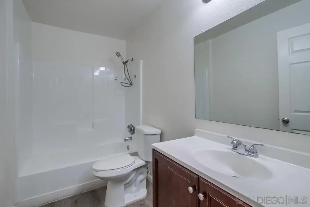 300 Filbert Street, Unit 2 El Cajon, CA 92020 - Photo 18 of 35 a bathroom with a sink a toilet and shower