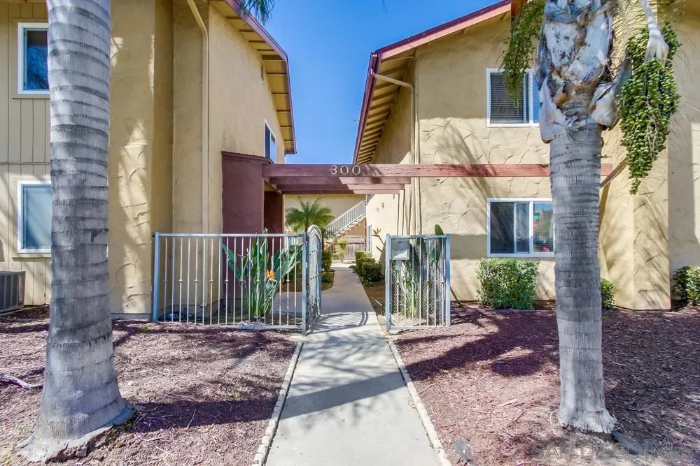 300 Filbert Street, Unit 2 El Cajon, CA 92020 - Photo 2 of 35 a view of a brick house with large windows and plants