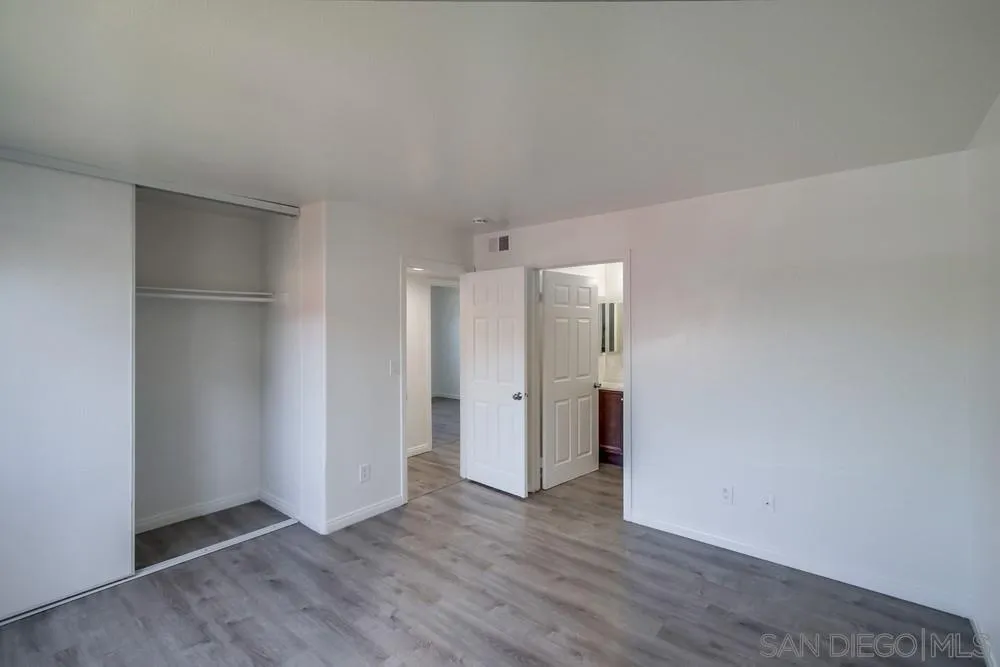 300 Filbert Street, Unit 2 El Cajon, CA 92020 - Photo 24 of 35 a view of an empty room with wooden floor and closet