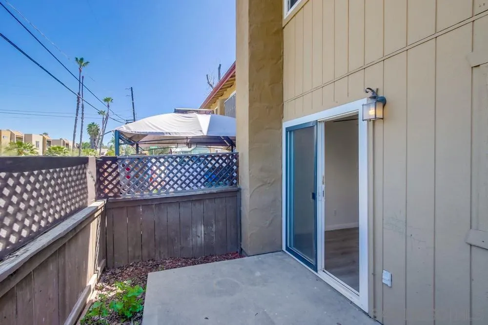 300 Filbert Street, Unit 2 El Cajon, CA 92020 - Photo 30 of 35 a view of a wooden fence and a stairs