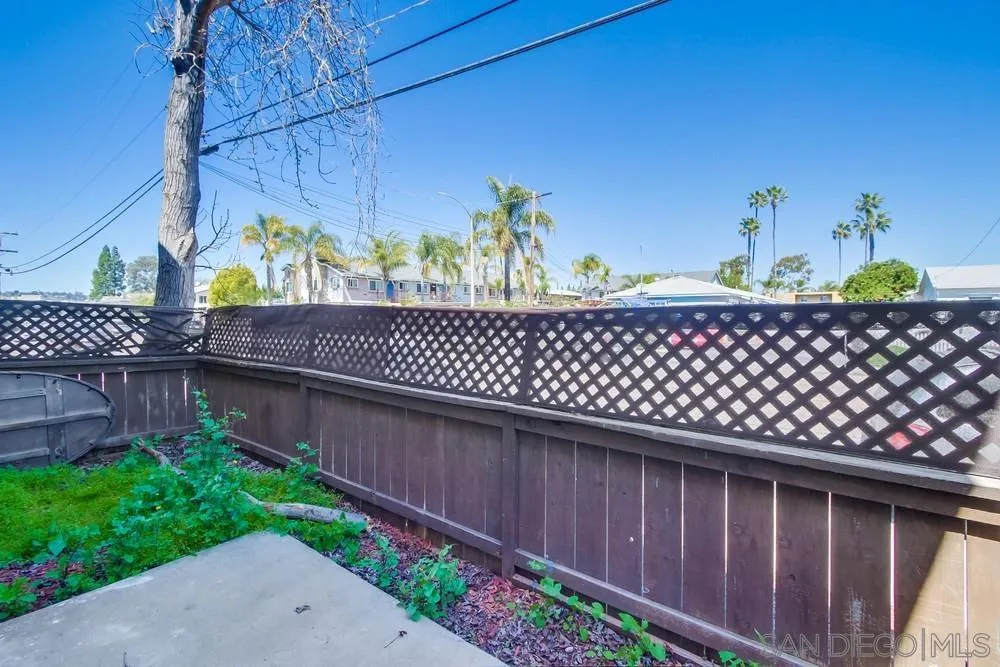 300 Filbert Street, Unit 2 El Cajon, CA 92020 - Photo 32 of 35 a wooden fence with trees in the background