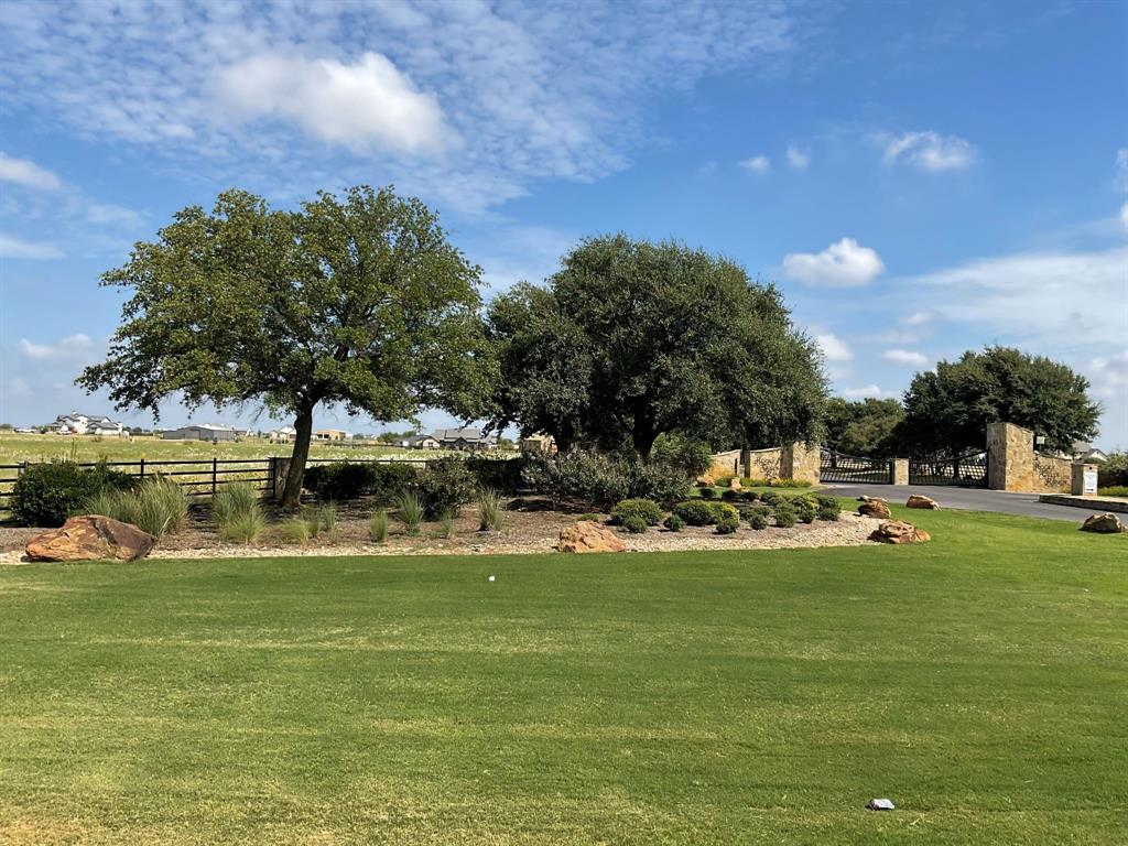 12700 West Rocky Creek Road Crowley, TX 76036 - Photo 2 of 39 a view of a lake with houses