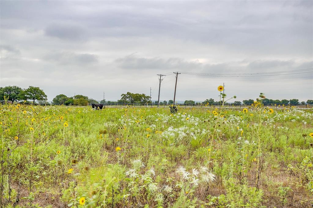 12700 West Rocky Creek Road Crowley, TX 76036 - Photo 21 of 39 a view of a large body of water with a building in the background