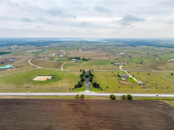 an aerial view of houses with outdoor space