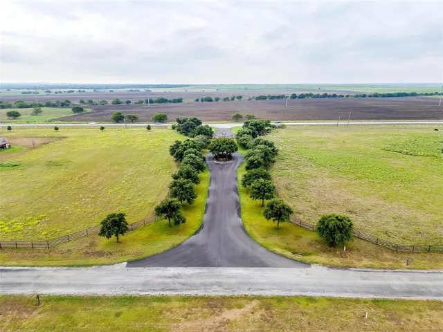 a view of a swimming pool with an ocean view