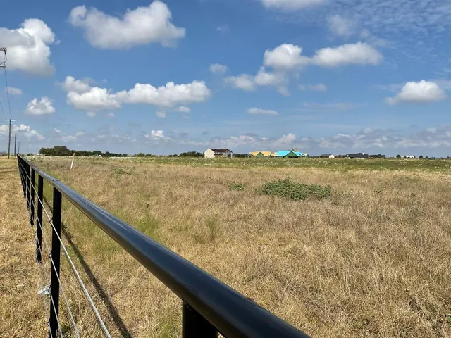a view of an ocean from a balcony