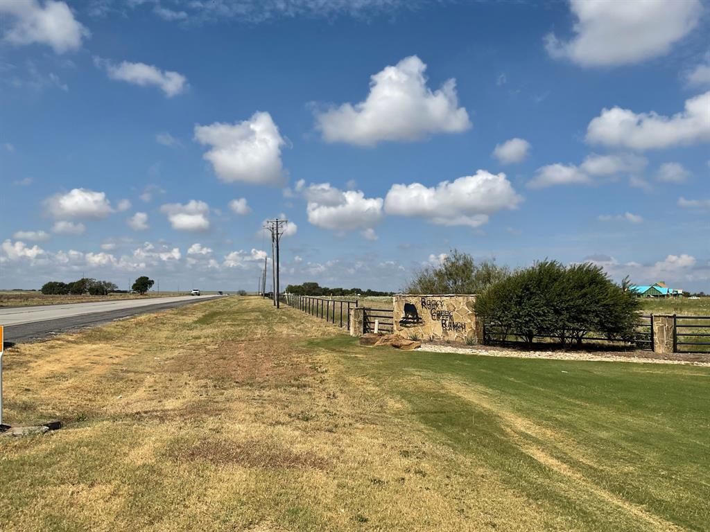 12700 West Rocky Creek Road Crowley, TX 76036 - Photo 7 of 39 a view of a swimming pool with an outdoor space and seating area