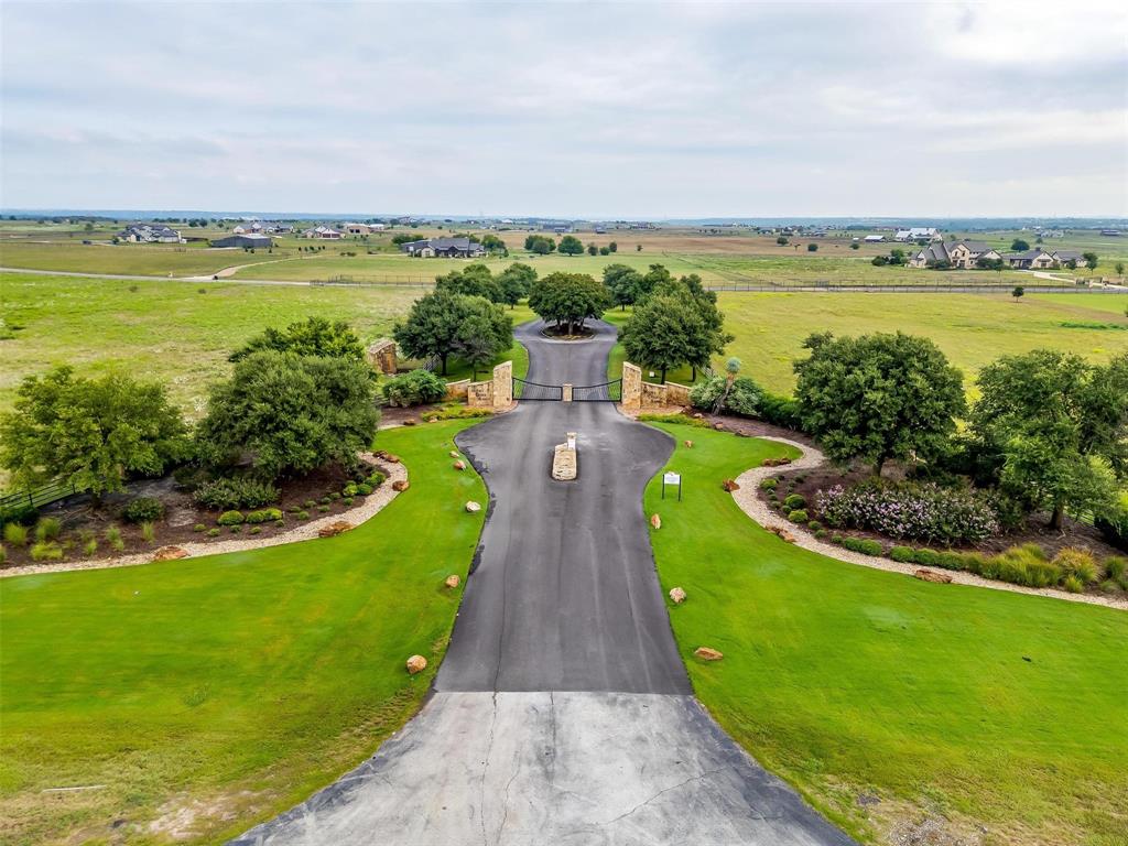 12700 West Rocky Creek Road Crowley, TX 76036 - Photo 9 of 39 a view of a lake with a garden