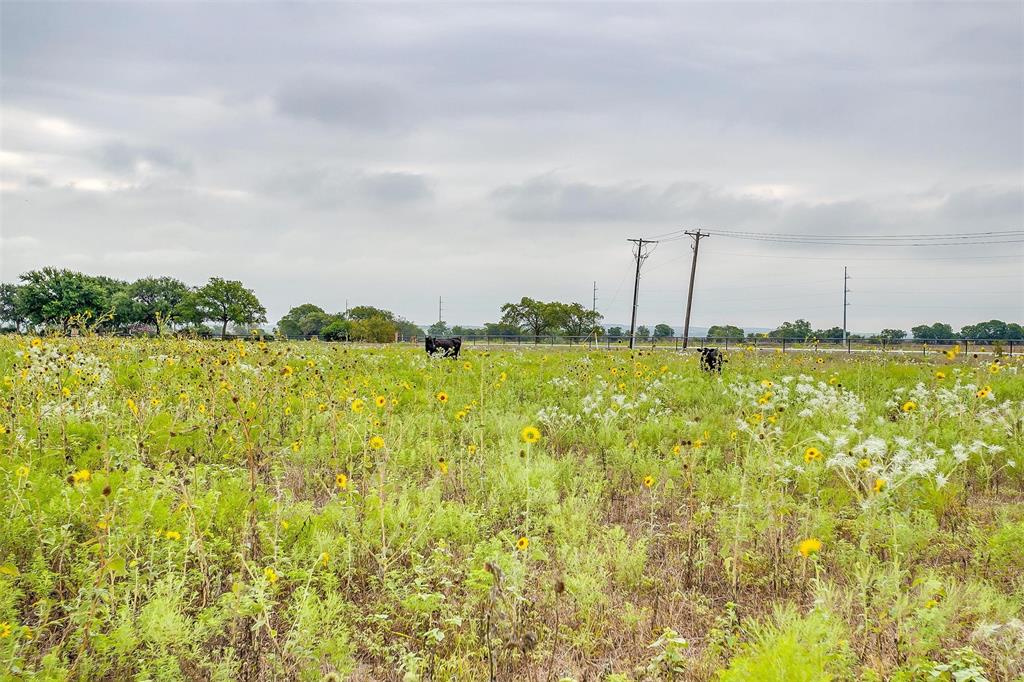 12700 West Rocky Creek Road Crowley, TX 76036 - Photo 10 of 39 a view of a swimming pool and an outdoor seating