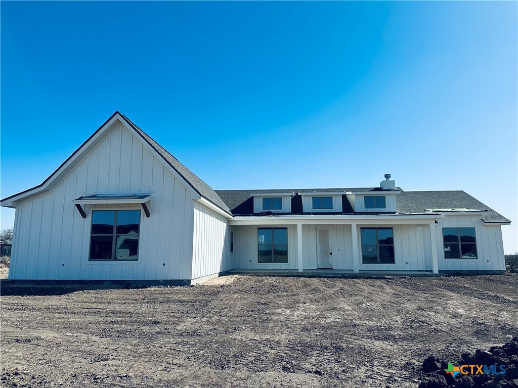 16033 Honey Ridge Drive Holland, TX 76534 - Photo 5 of 7 a front view of a house with a garden