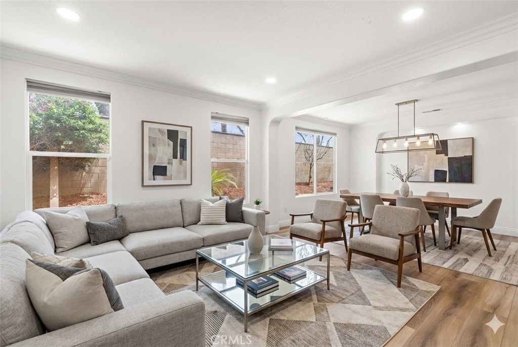 2 Dos Rios Irvine, CA 92602 - Photo 4 of 64 a living room with furniture and a large window