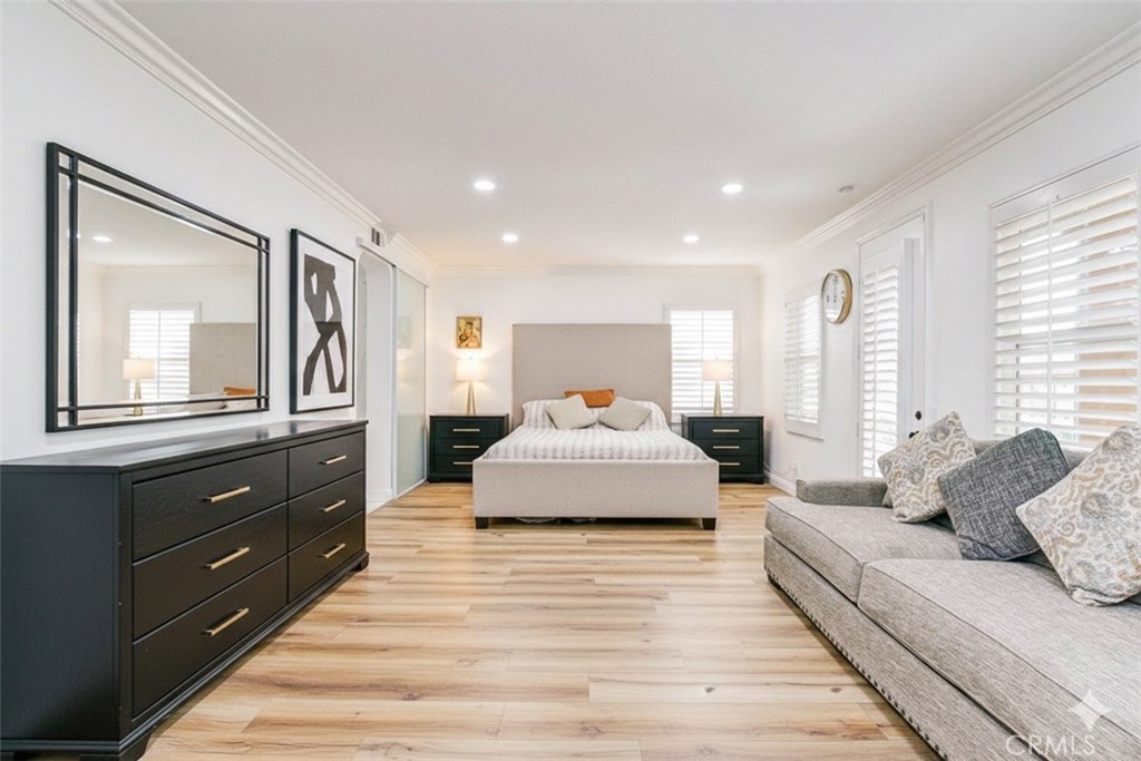 2 Dos Rios Irvine, CA 92602 - Photo 54 of 64 a spacious bedroom with a large bed and a dresser