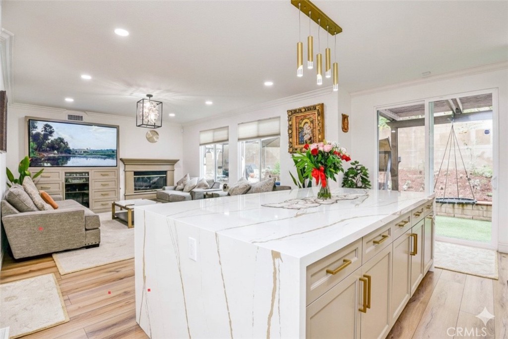 2 Dos Rios Irvine, CA 92602 - Photo 55 of 64 a large kitchen with kitchen island granite countertop a large counter top and stainless steel appliances