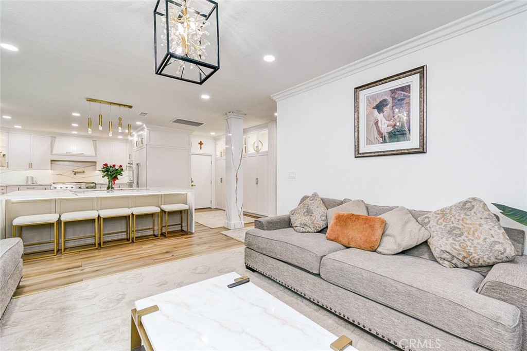 2 Dos Rios Irvine, CA 92602 - Photo 59 of 64 a living room with furniture and kitchen view