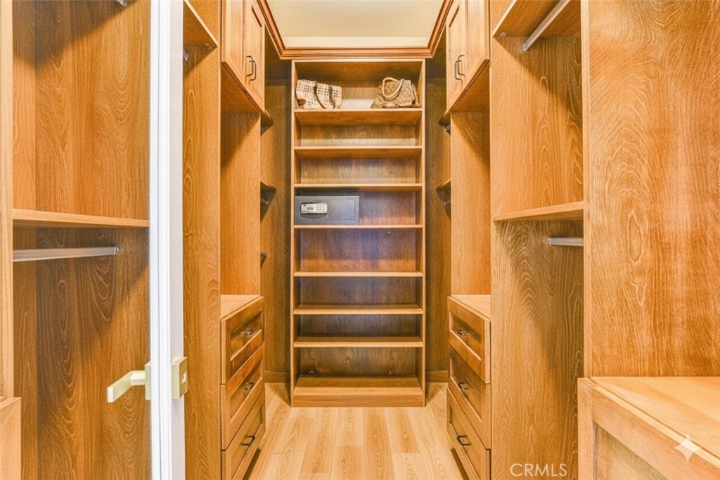 2 Dos Rios Irvine, CA 92602 - Photo 62 of 64 a view of walk in closet with empty racks