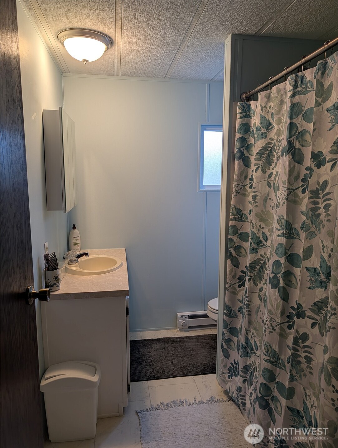 4000 Flynn Street, Unit 50 Bellingham, WA 98229 - Photo 9 of 15 a bathroom with a sink toilet and shower