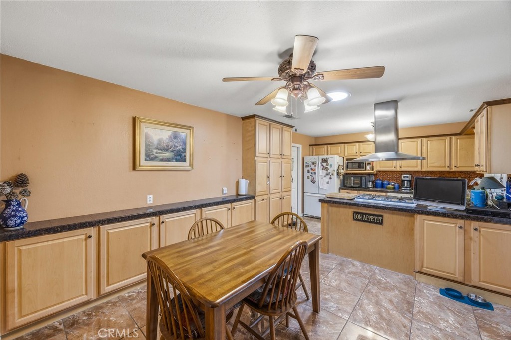 1539 Robyn Street Redlands, CA 92374 - Photo 12 of 47 a kitchen with a table and chairs in it