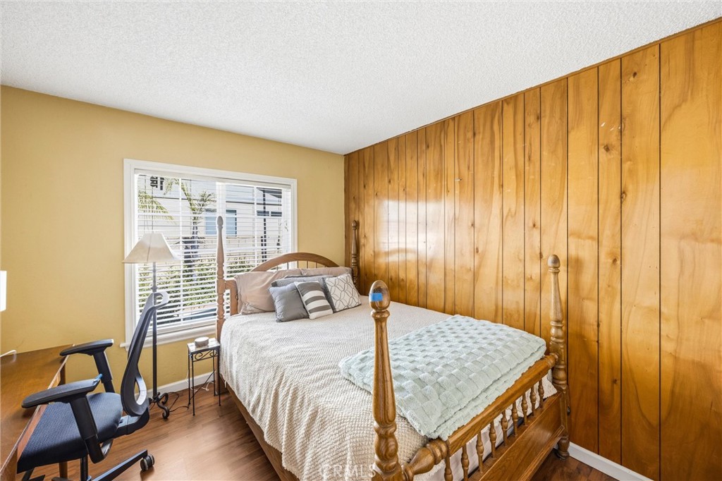 1539 Robyn Street Redlands, CA 92374 - Photo 23 of 47 a bed sitting in a bedroom next to a window