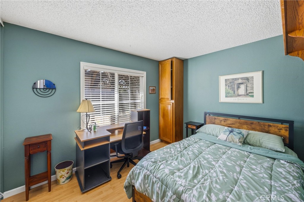 1539 Robyn Street Redlands, CA 92374 - Photo 24 of 47 a bedroom with a bed and a window