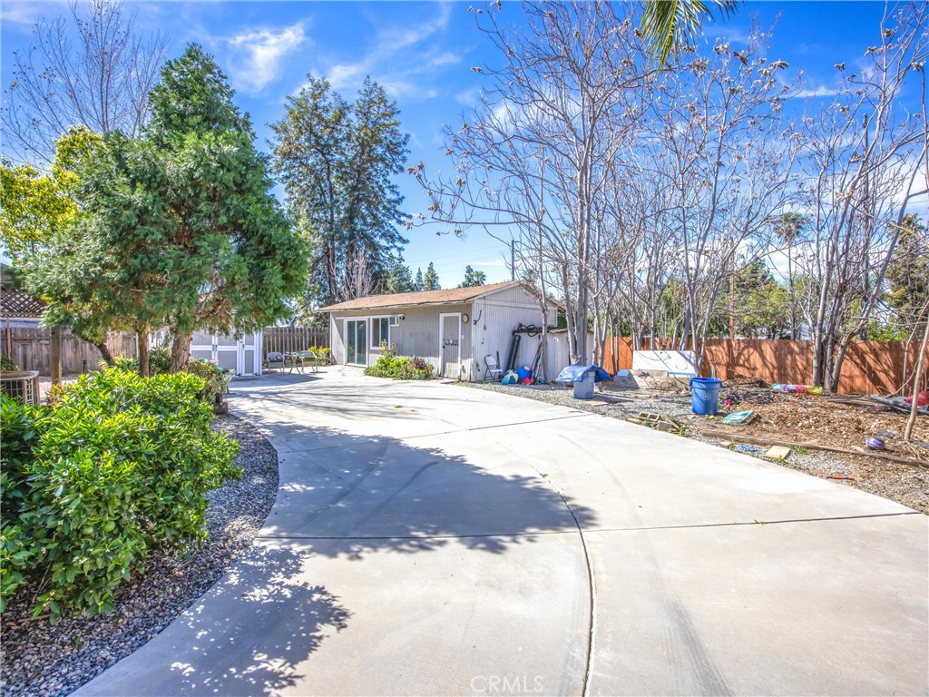 1539 Robyn Street Redlands, CA 92374 - Photo 37 of 47 a house with trees in front of it
